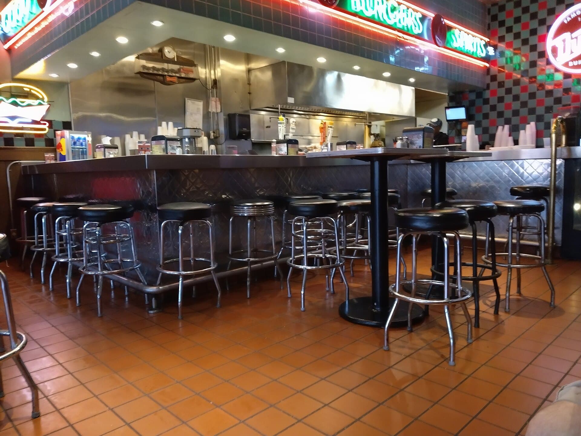 The lunch counter and neon signs inside Dyer's Burgers on Beale Street in Memphis