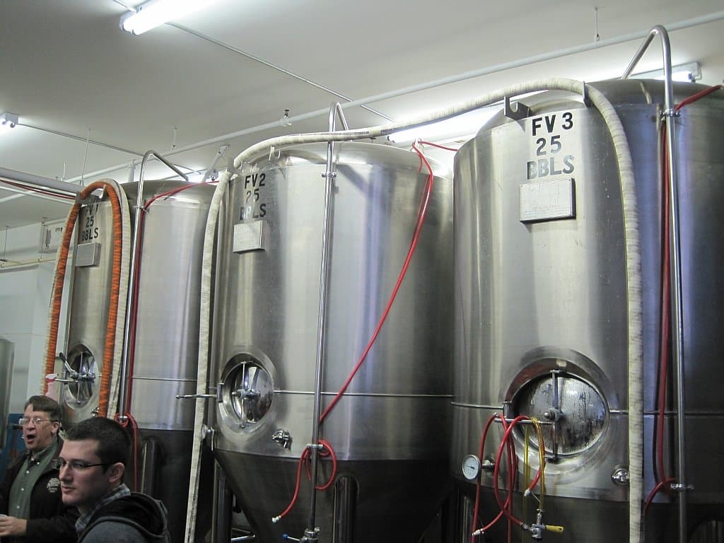 Stainless fermentation tanks inside Ghost River Brewing, one of Memphis's oldest craft breweries