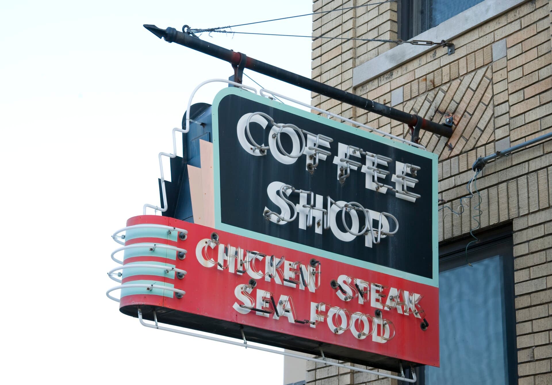 Vintage neon Coffee Shop sign on a brick building near the Lorraine Motel in downtown Memphis