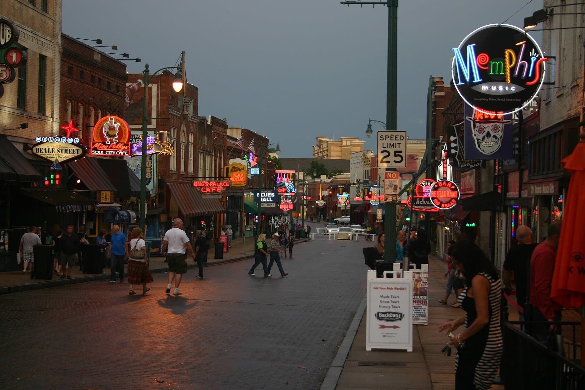 The neon signs of the Beale Street entertainment district at dusk in downtown Memphis, the city's live-music heart